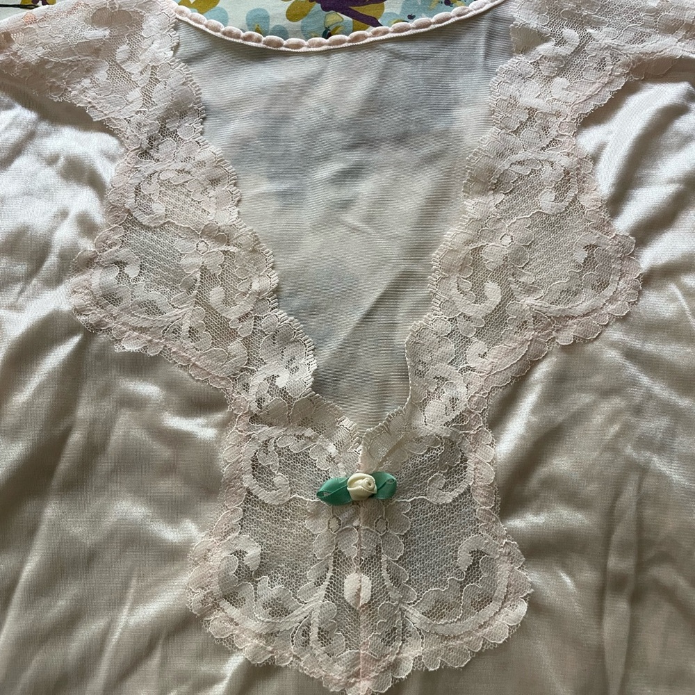 Maiden form pale pink vintage nylon top with lace and rosette details